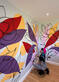 Kathleen working with paints and materials